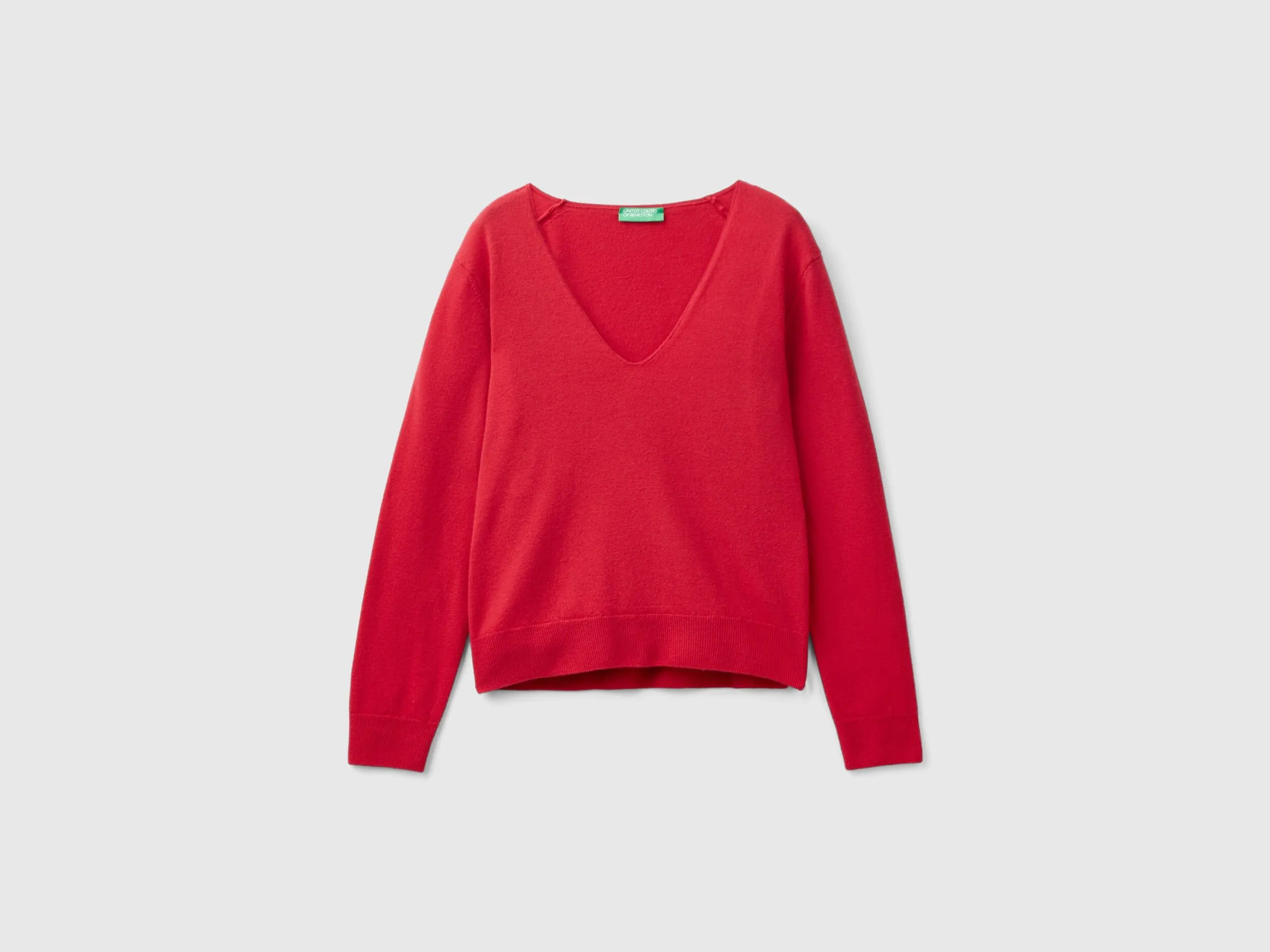 Red plum V-neck sweater in pure Merino wool - Plum | Benetton