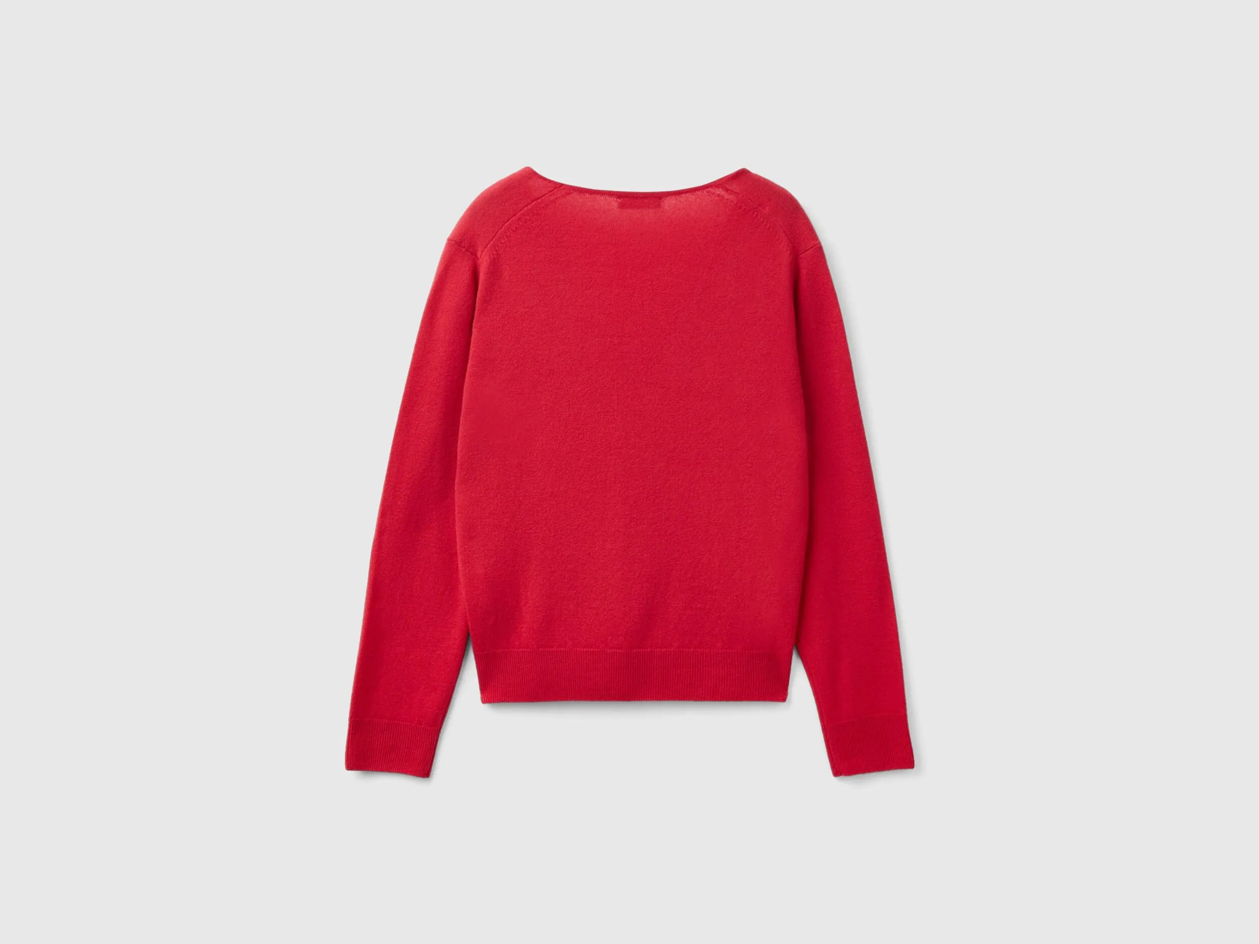 Red plum V-neck sweater in pure Merino wool - Plum | Benetton