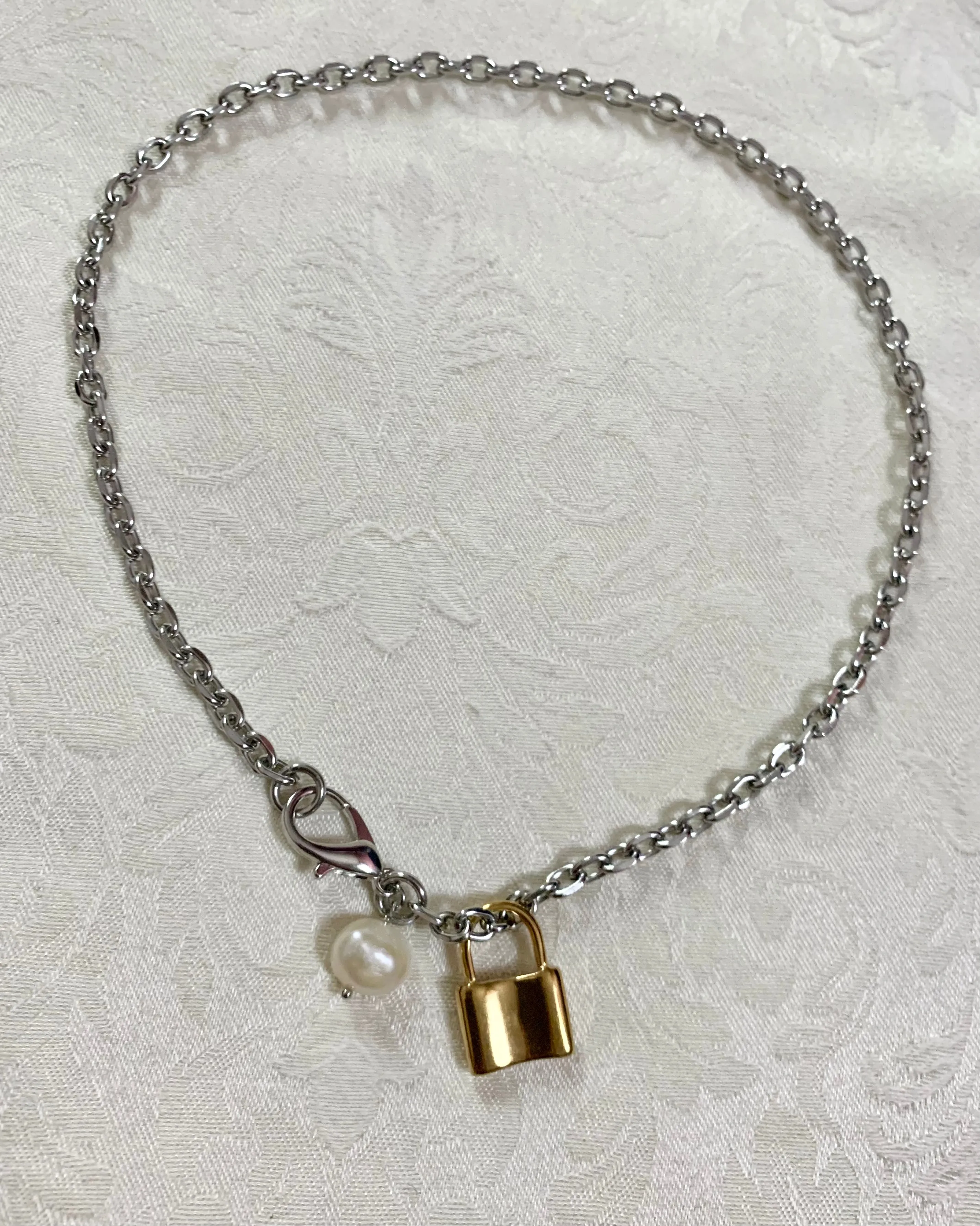 Simple pearl + lock charm necklace