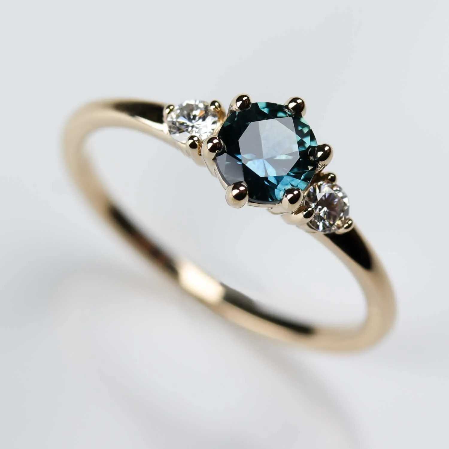 Three Stone Ring with 5mm Montana Sapphire Center Stone