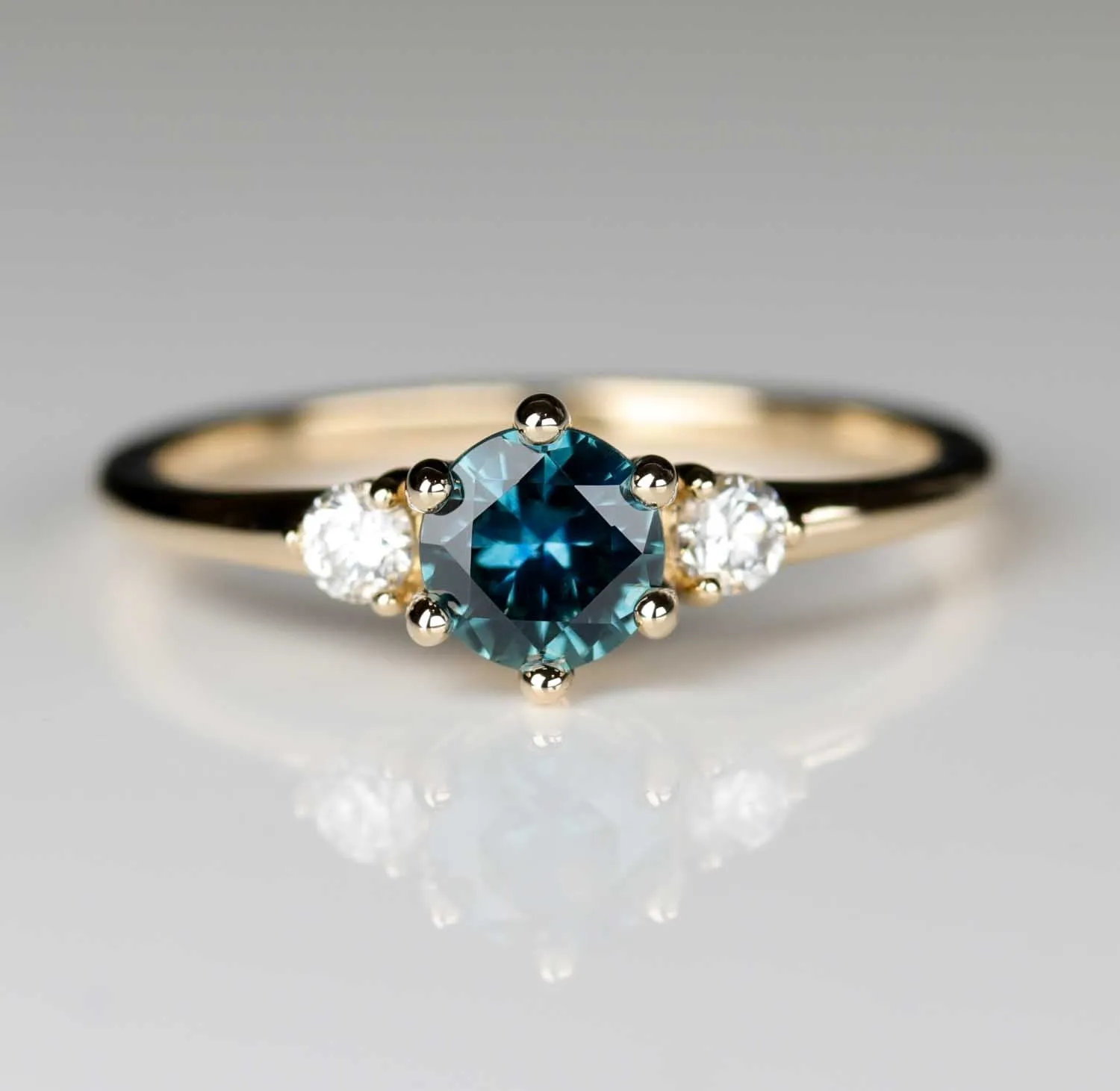 Three Stone Ring with 5mm Montana Sapphire Center Stone