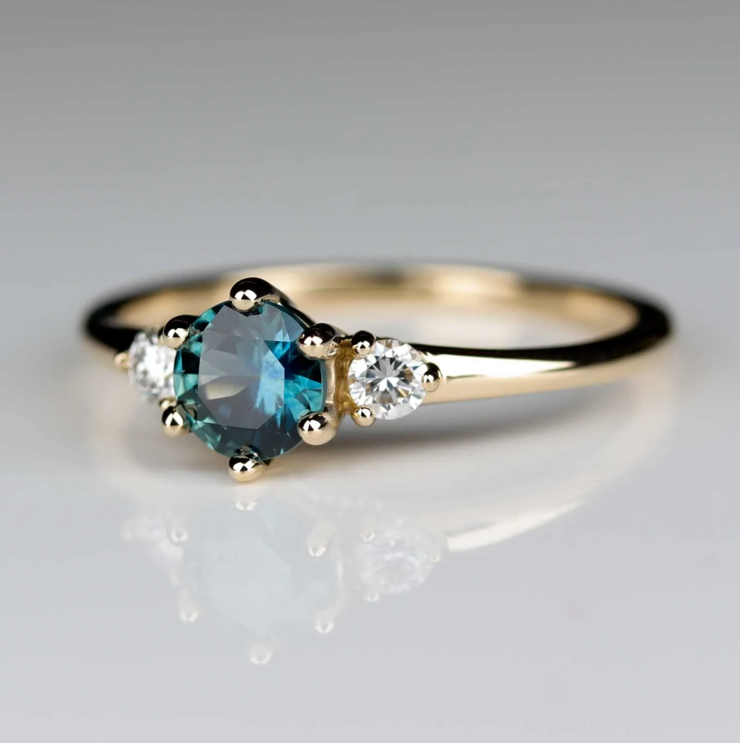 Three Stone Ring with 5mm Montana Sapphire Center Stone